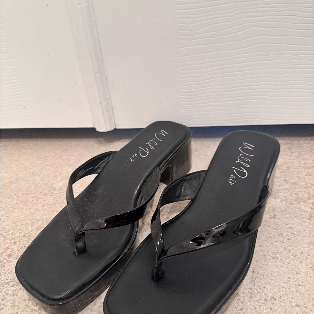 Wild Pair Black Heels with Elegant Design